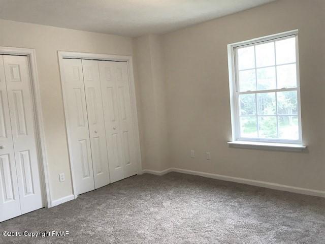 6305 Laurel Road Pocono Summit, PA 18346 - Photo 12 of 13 an empty room with a window