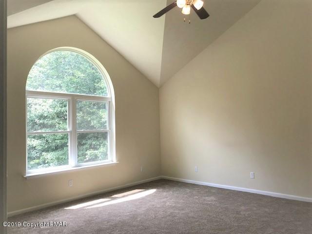 6305 Laurel Road Pocono Summit, PA 18346 - Photo 9 of 13 an empty room with a window