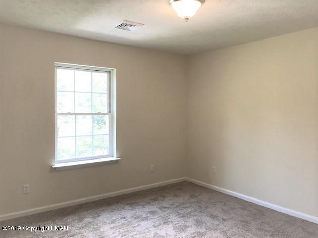 6305 Laurel Road Pocono Summit, PA 18346 - Photo 10 of 13 an empty room with a window