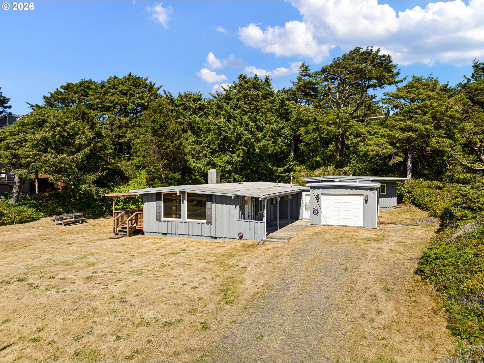 88481 1st Avenue Florence, OR 97439 - Photo 30 of 43 a view of a house with a yard
