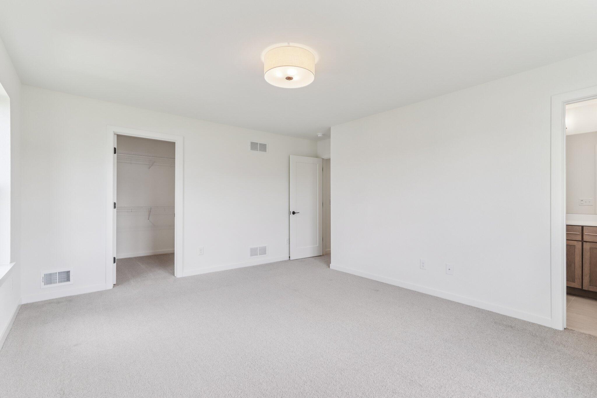 2701 Mapleton Avenue East Troy, WI 53120 - Photo 13 of 28 2701 Mapleton Ave 13 Primary Bedroom