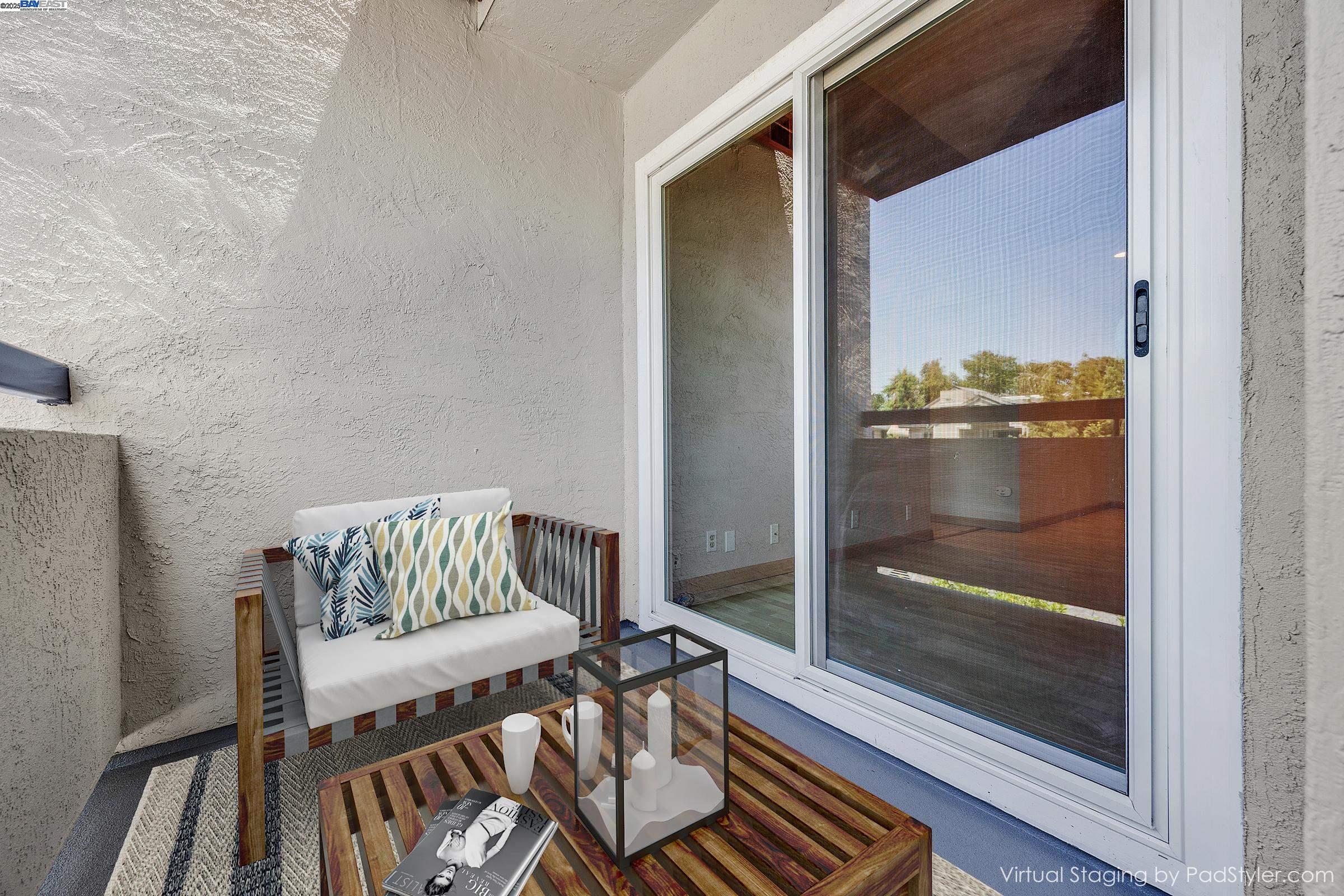 1308 Walden Road, Unit 37 Walnut Creek, CA 94597 - Photo 15 of 27 a view of a hallway with wooden floor and glass door