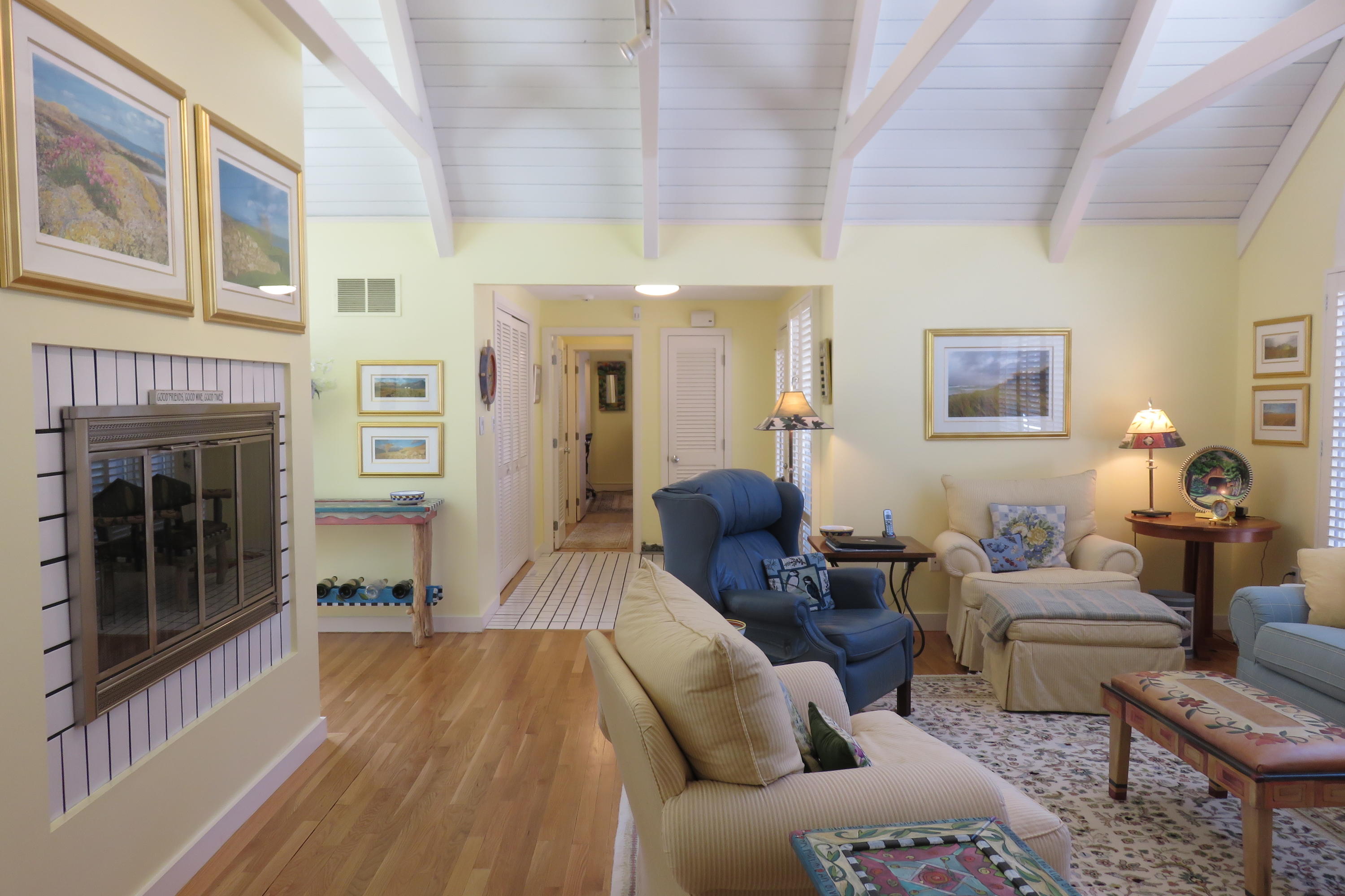 30 Greensward Road Mashpee, MA 02649 - Photo 12 of 33 a living room with furniture and a fireplace