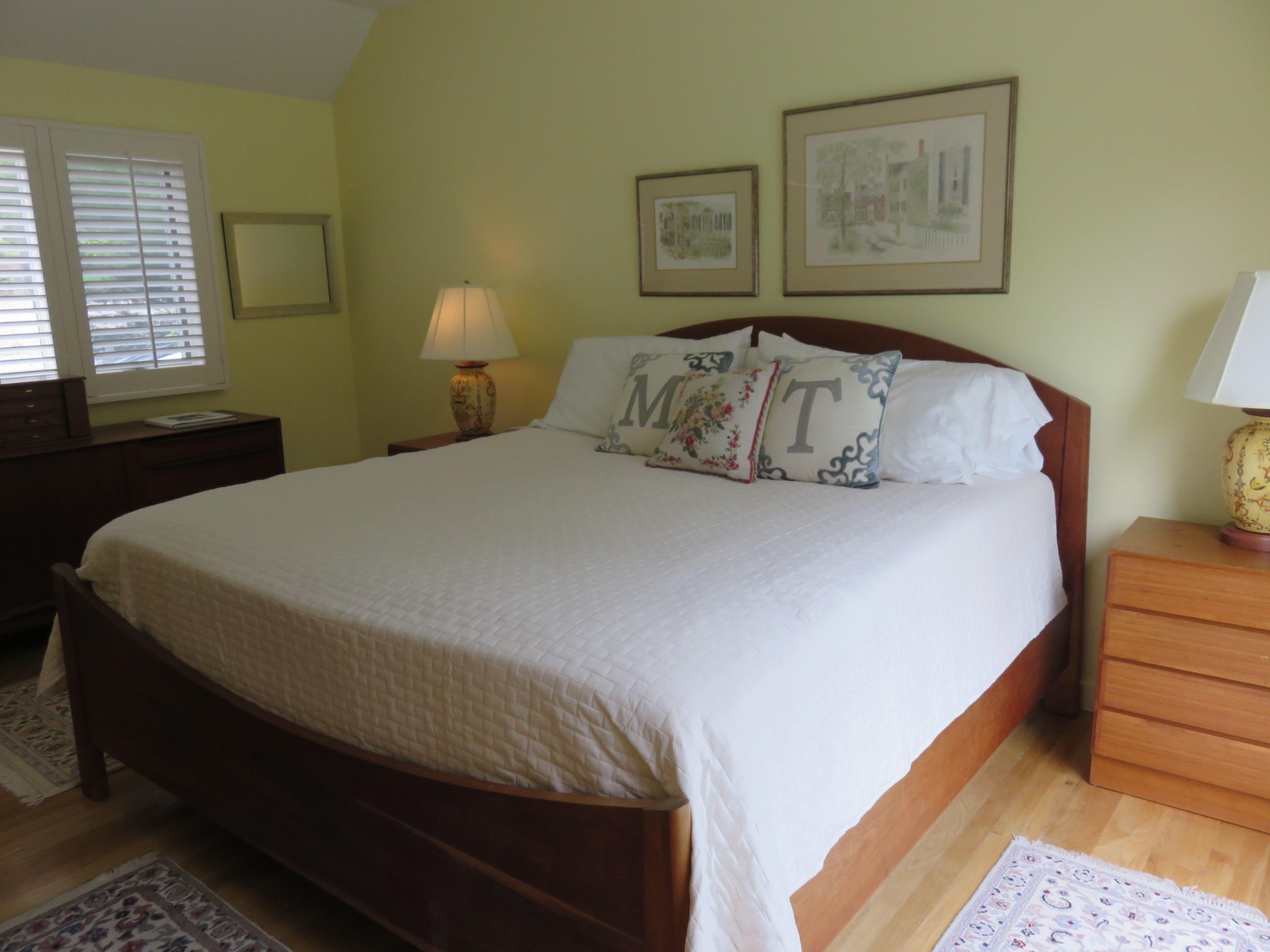 30 Greensward Road Mashpee, MA 02649 - Photo 18 of 33 a bed sitting in a bedroom next to a window