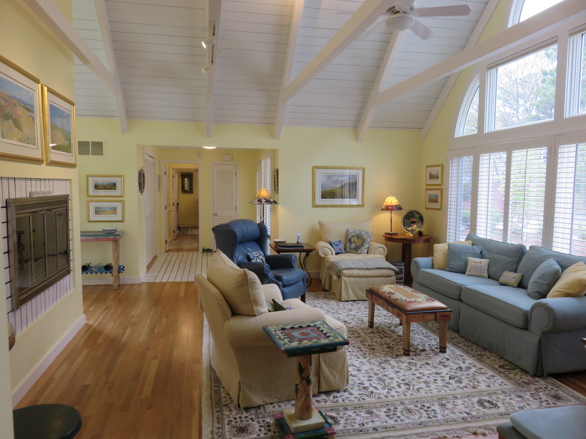 30 Greensward Road Mashpee, MA 02649 - Photo 27 of 33 a living room with furniture and a fireplace