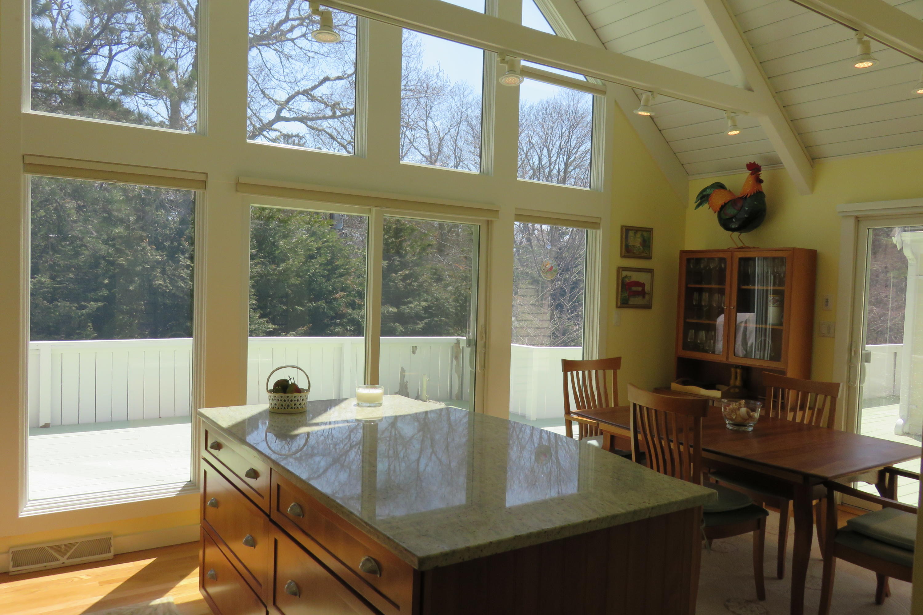 30 Greensward Road Mashpee, MA 02649 - Photo 9 of 33 a view of a dining room with furniture window and outside view
