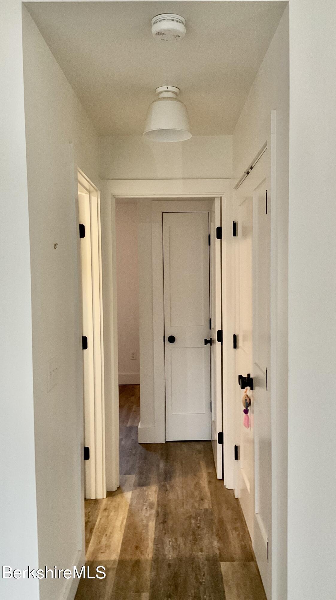 447 Algerie Road East Otis, MA 01029 - Photo 5 of 10 Hallway to Primary Bedroom