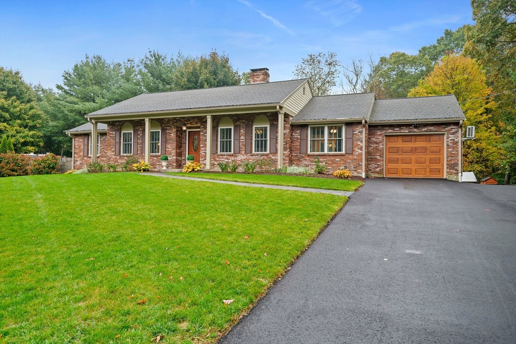 18 Sunnybrook Lane Canton, MA 02021 - Photo 1 of 40 a front view of house with yard barbeque and outdoor seating