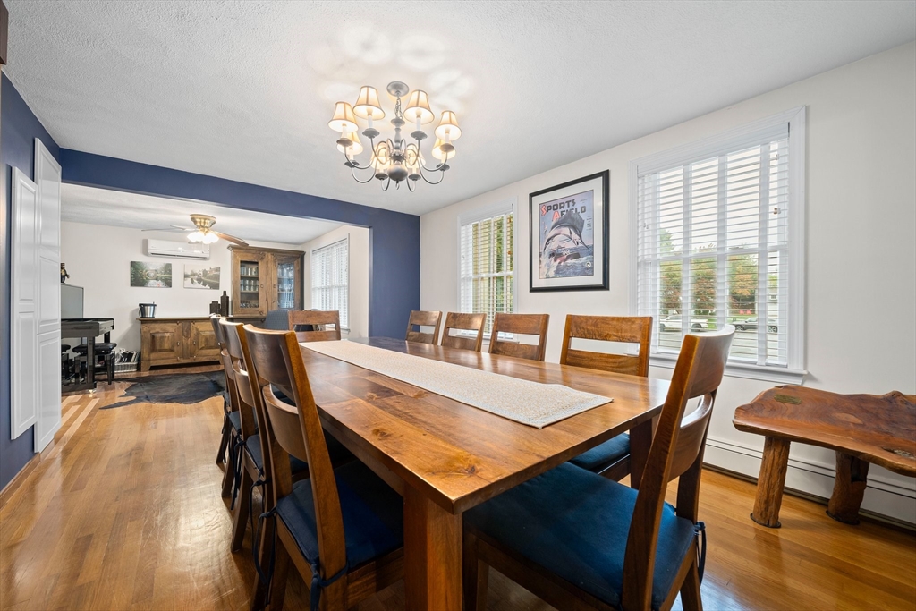 18 Sunnybrook Lane Canton, MA 02021 - Photo 13 of 40 a view of a dining room with furniture window and wooden floor