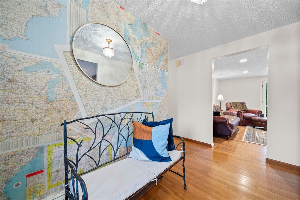 18 Sunnybrook Lane Canton, MA 02021 - Photo 14 of 40 a living room with furniture and a mirror