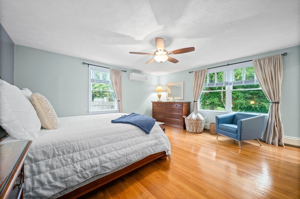 18 Sunnybrook Lane Canton, MA 02021 - Photo 18 of 40 a bedroom with a bed and a large window