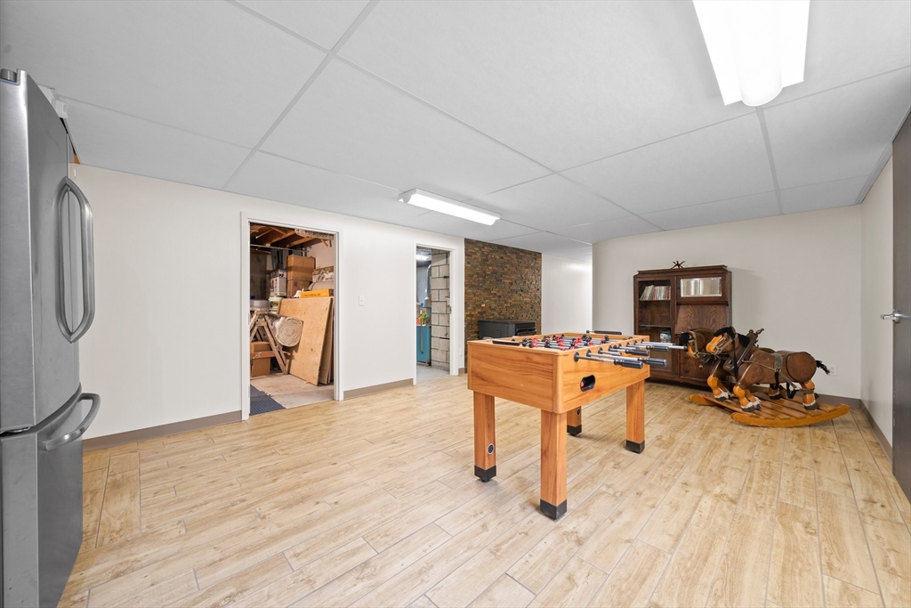 18 Sunnybrook Lane Canton, MA 02021 - Photo 25 of 40 a living room with furniture and a wooden floor