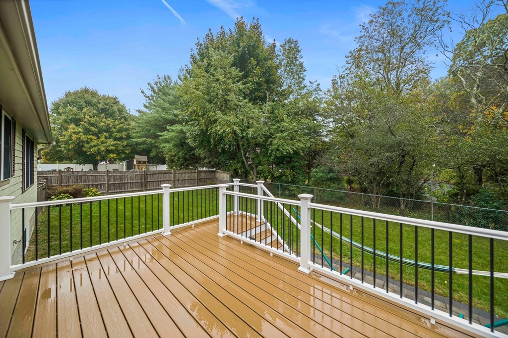18 Sunnybrook Lane Canton, MA 02021 - Photo 30 of 40 a view of balcony with deck and wooden floor