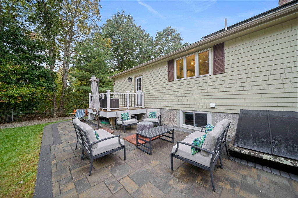 18 Sunnybrook Lane Canton, MA 02021 - Photo 32 of 40 a view of a patio with a table and chairs