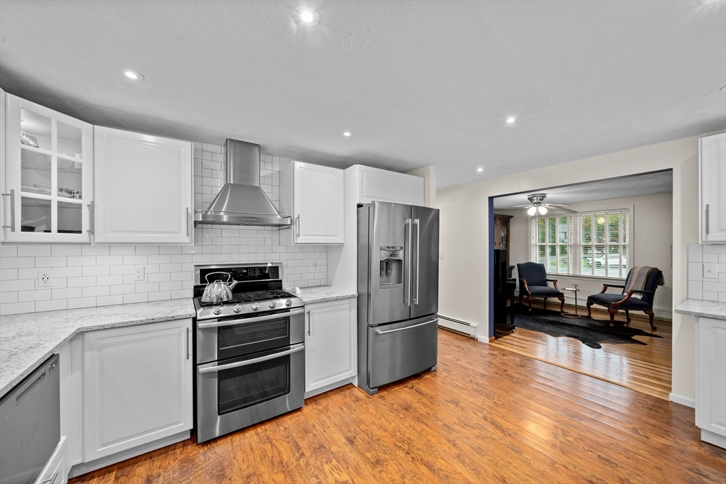 18 Sunnybrook Lane Canton, MA 02021 - Photo 9 of 40 a kitchen with stainless steel appliances a refrigerator stove and sink