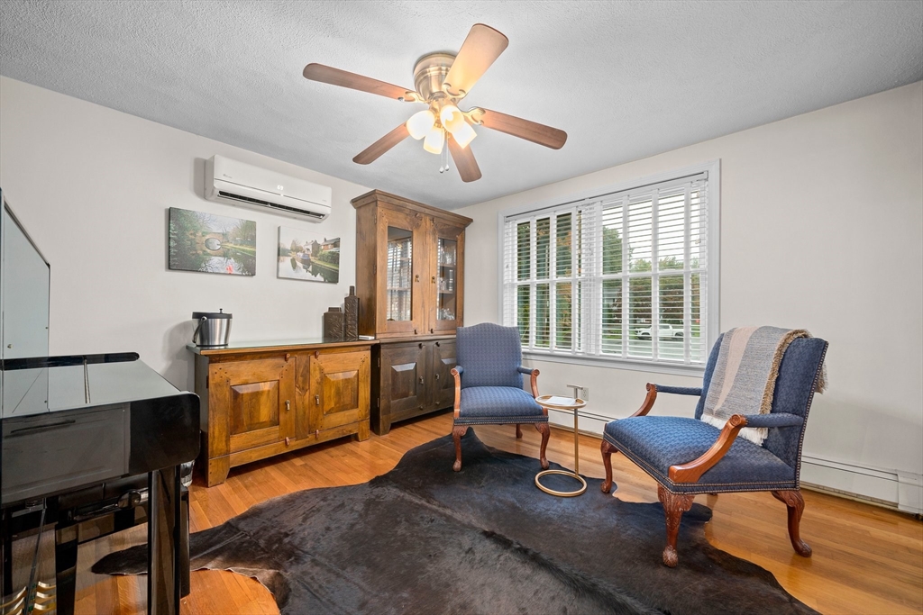 18 Sunnybrook Lane Canton, MA 02021 - Photo 10 of 40 a living room with furniture and a window