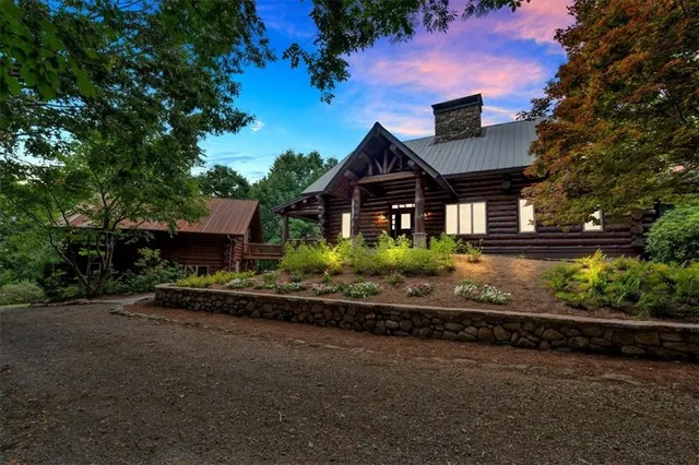 front view of a house with a bench