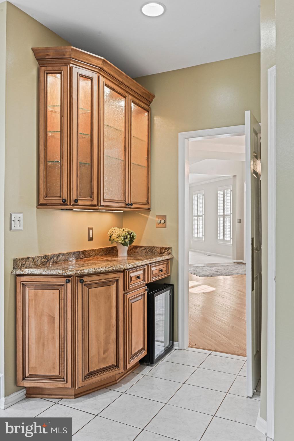 1831 Beulah Road Vienna, VA 22182 - Photo 17 of 96 a kitchen with stainless steel appliances granite countertop a stove and a refrigerator