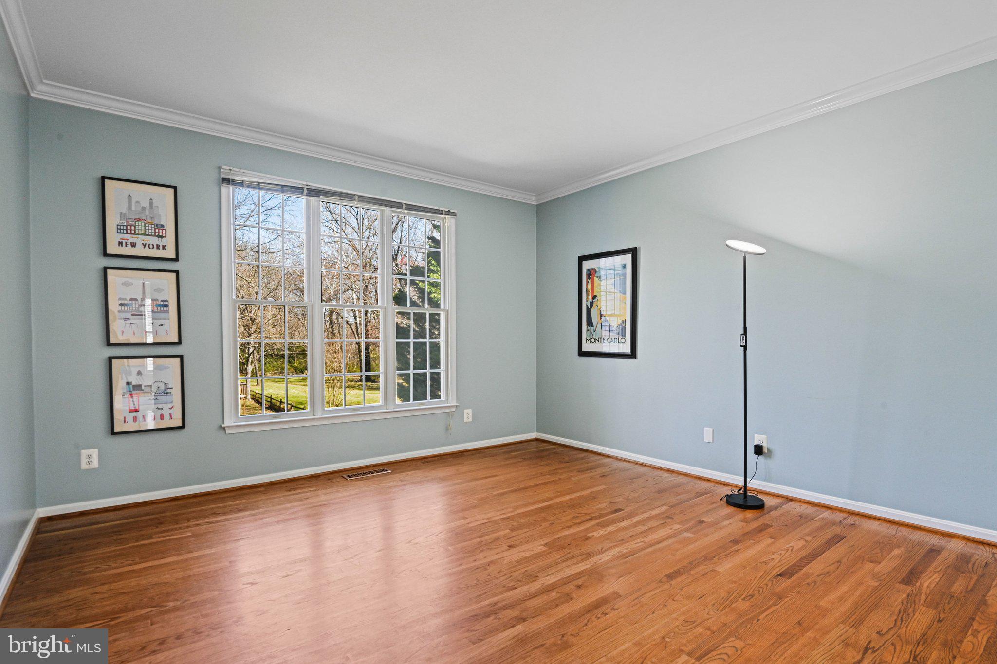 1831 Beulah Road Vienna, VA 22182 - Photo 26 of 96 a view of an empty room with a window and wooden floor