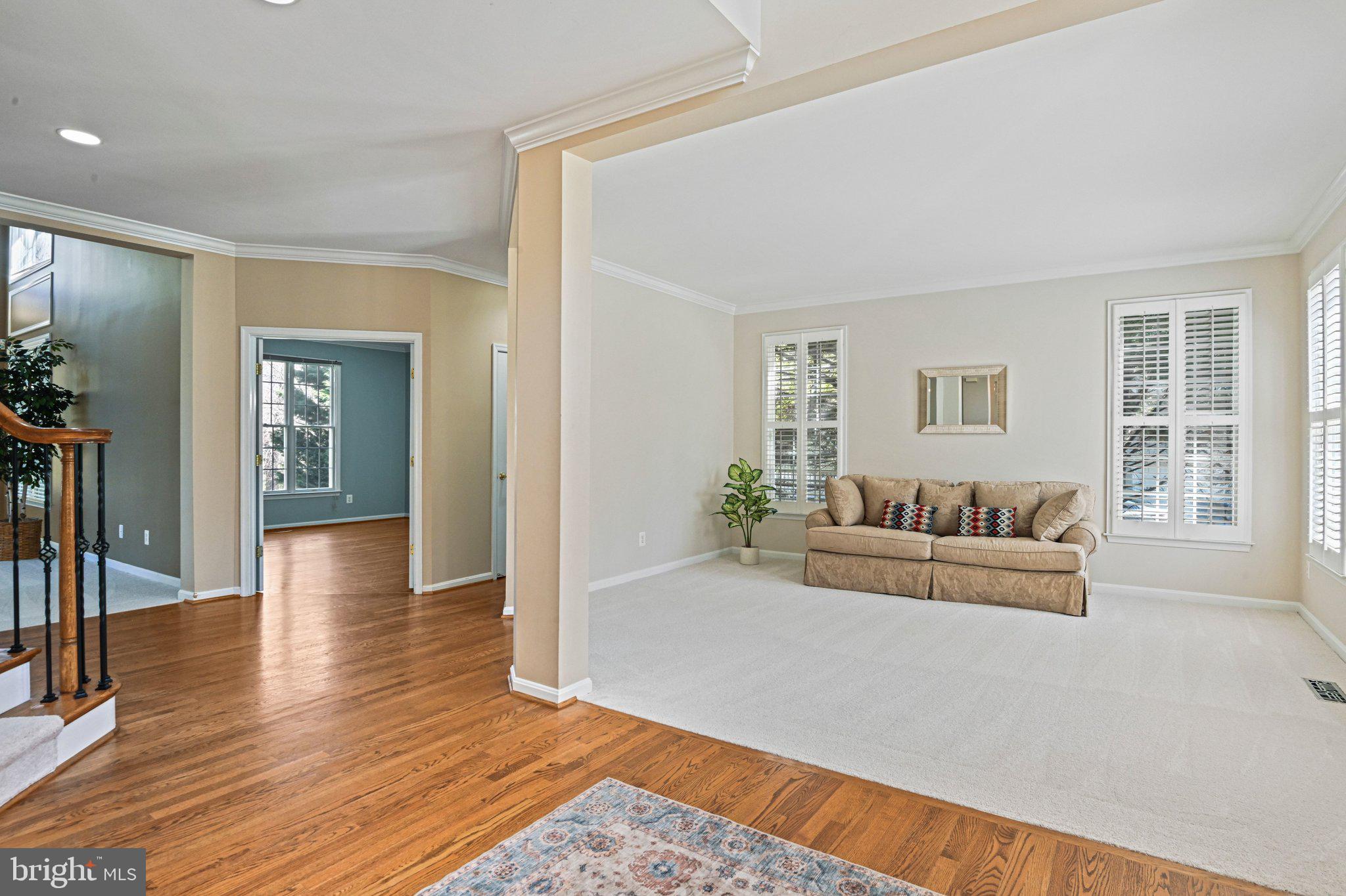 1831 Beulah Road Vienna, VA 22182 - Photo 27 of 96 a living room with furniture and a wooden floor