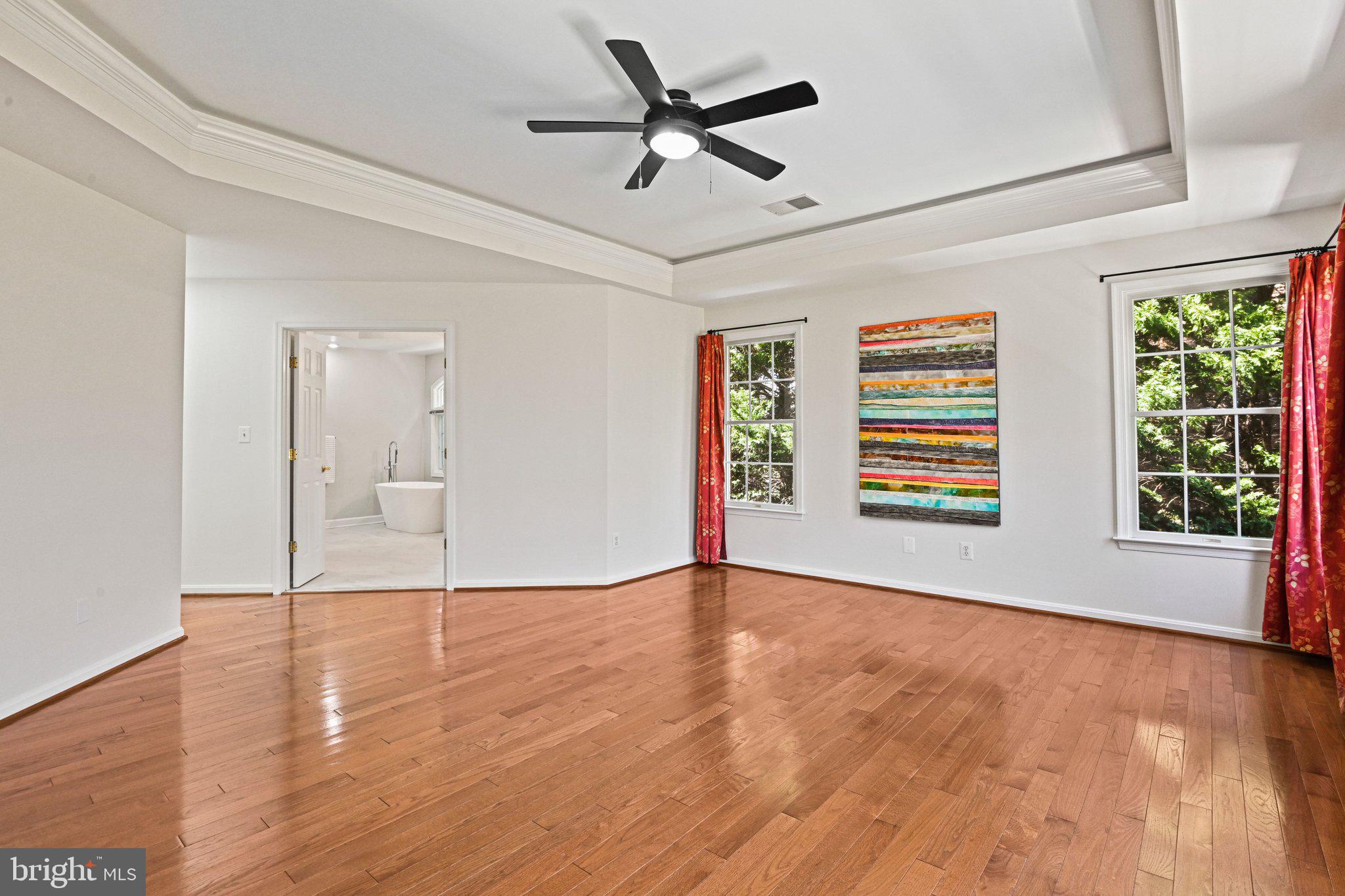 1831 Beulah Road Vienna, VA 22182 - Photo 30 of 96 a view of an empty room with a window and wooden floor