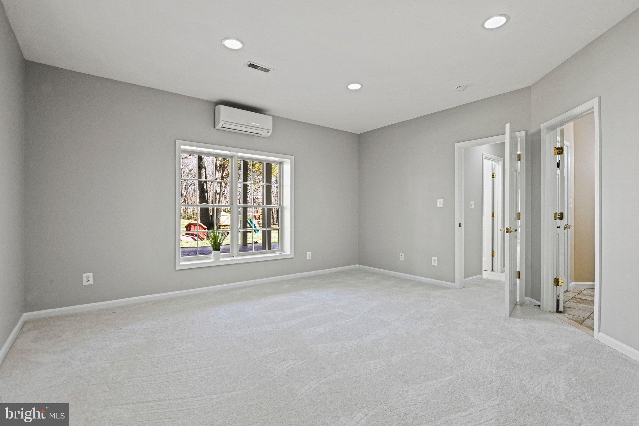 1831 Beulah Road Vienna, VA 22182 - Photo 65 of 96 an empty room with windows and closet