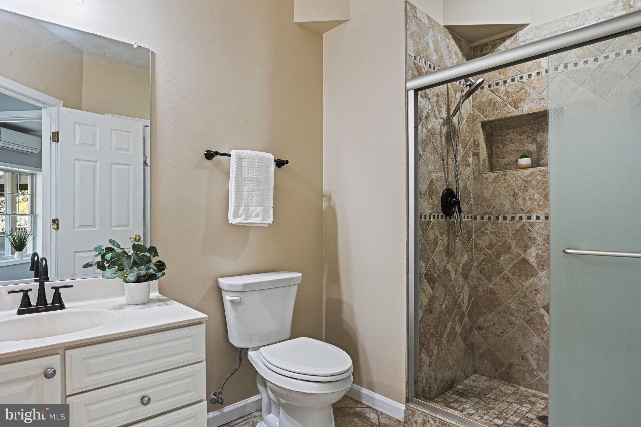 1831 Beulah Road Vienna, VA 22182 - Photo 68 of 96 a bathroom with a sink toilet and shower
