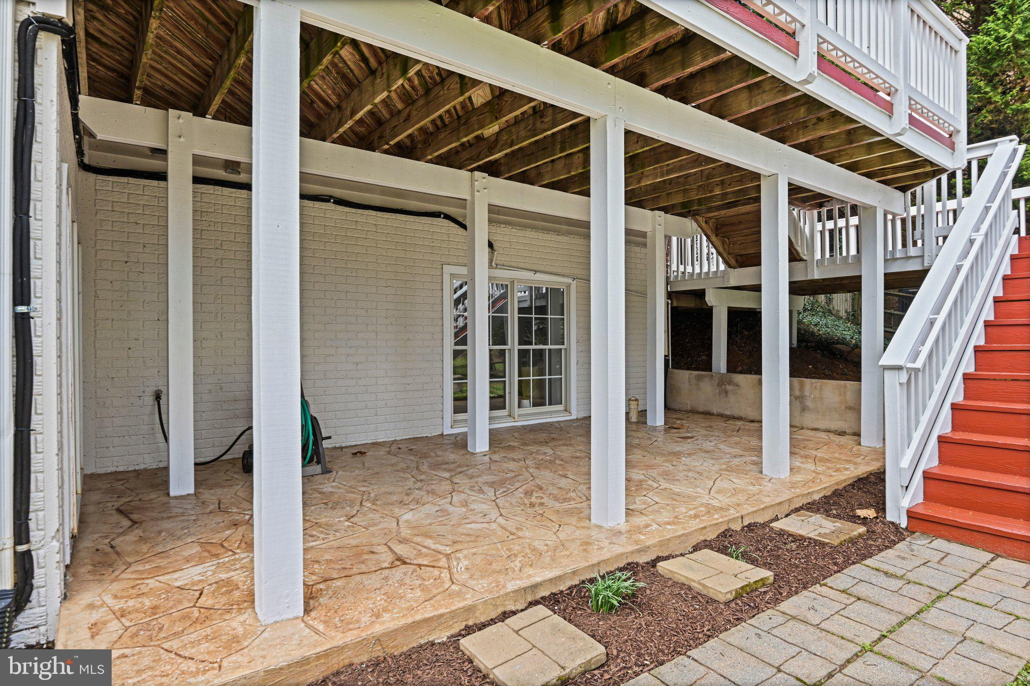 1831 Beulah Road Vienna, VA 22182 - Photo 77 of 96 Covered concrete patio and paver walkway