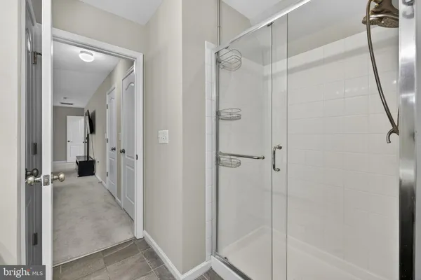 a white bath tub sitting next to a window