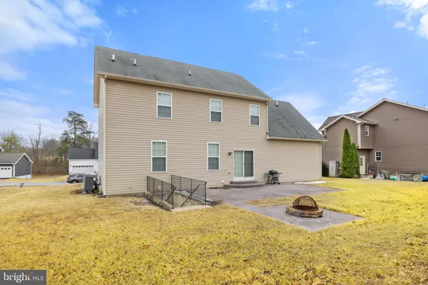 a view of a swimming pool and an outdoor space