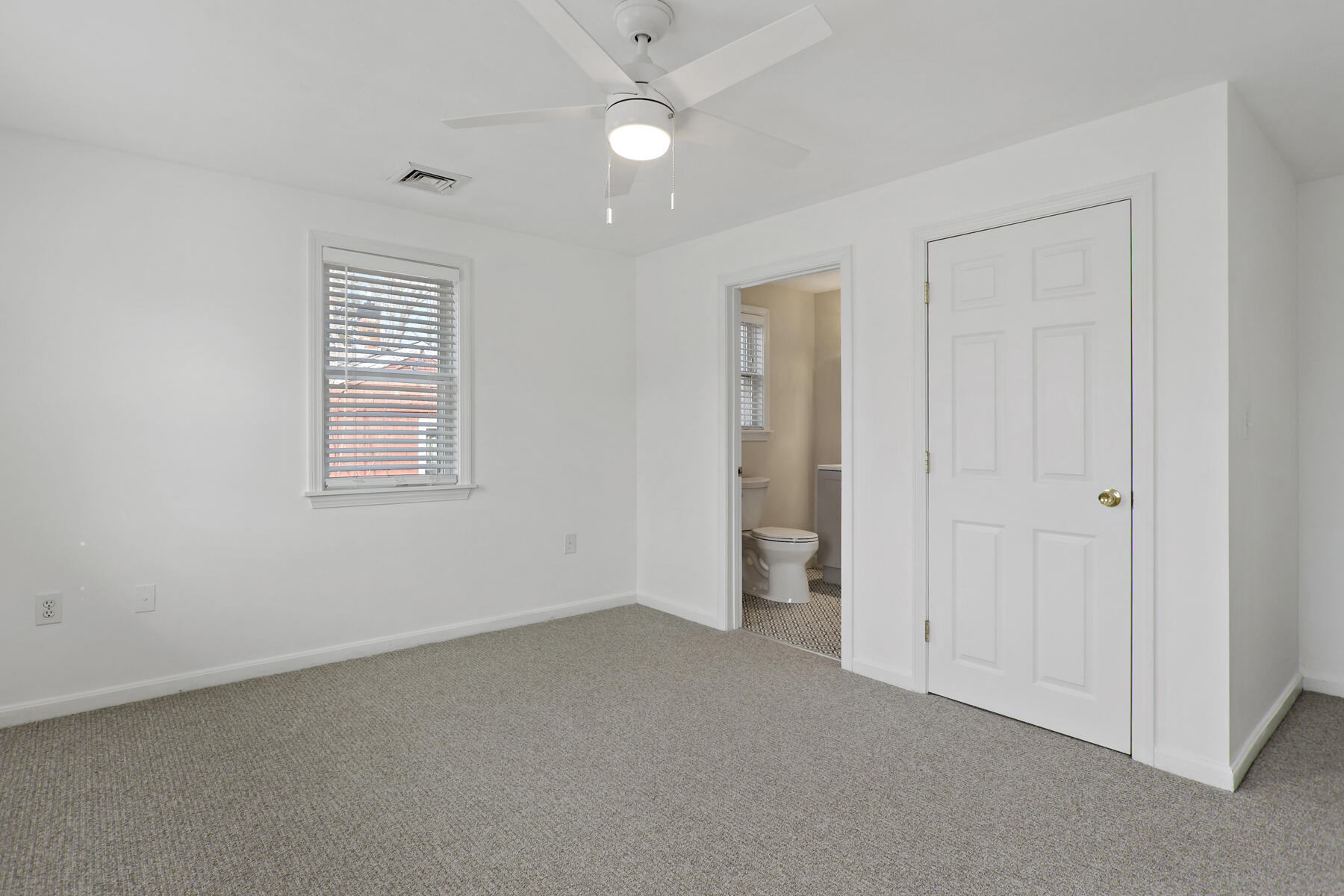 20 Evergreen Street Onset, MA 02558 - Photo 15 of 26 an empty room with a window and ceiling fan