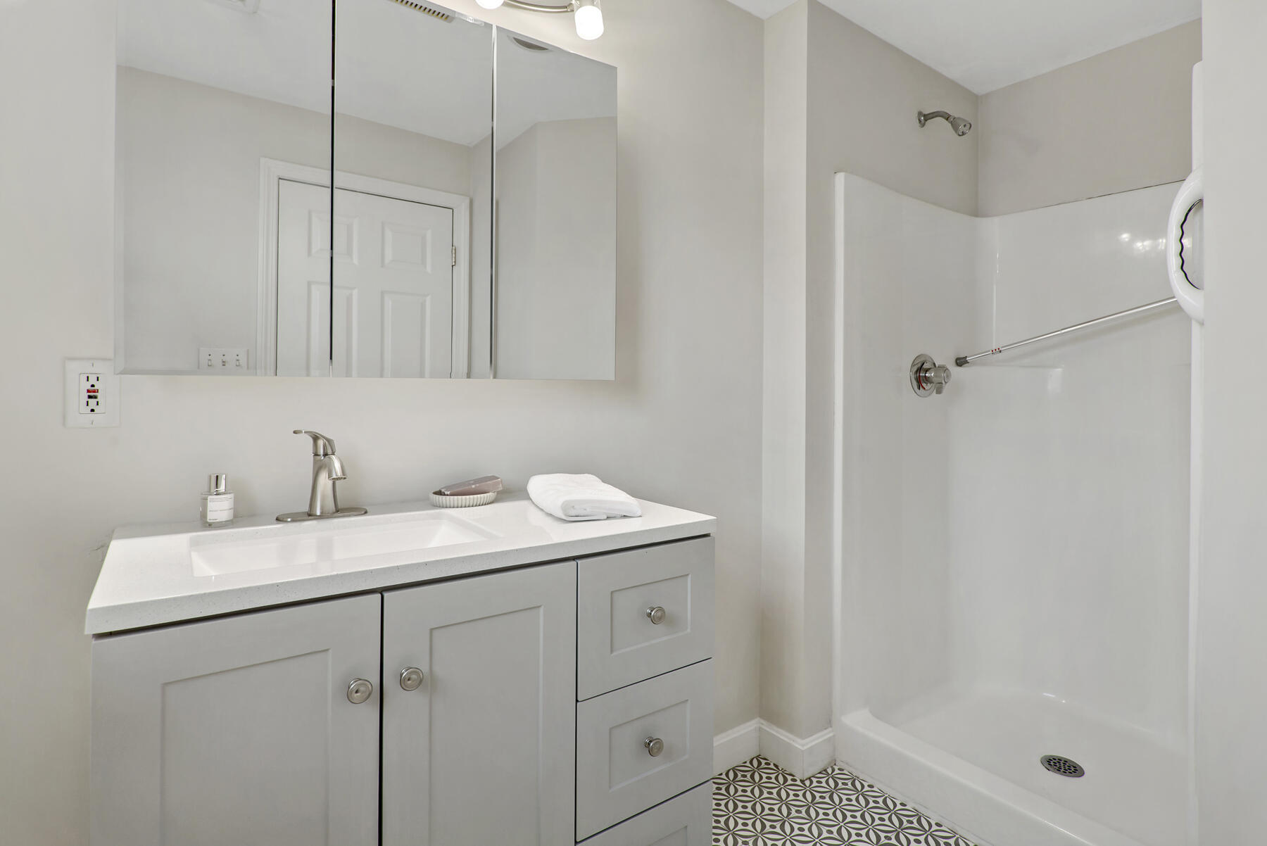 20 Evergreen Street Onset, MA 02558 - Photo 17 of 26 a bathroom with a sink a vanity and a mirror