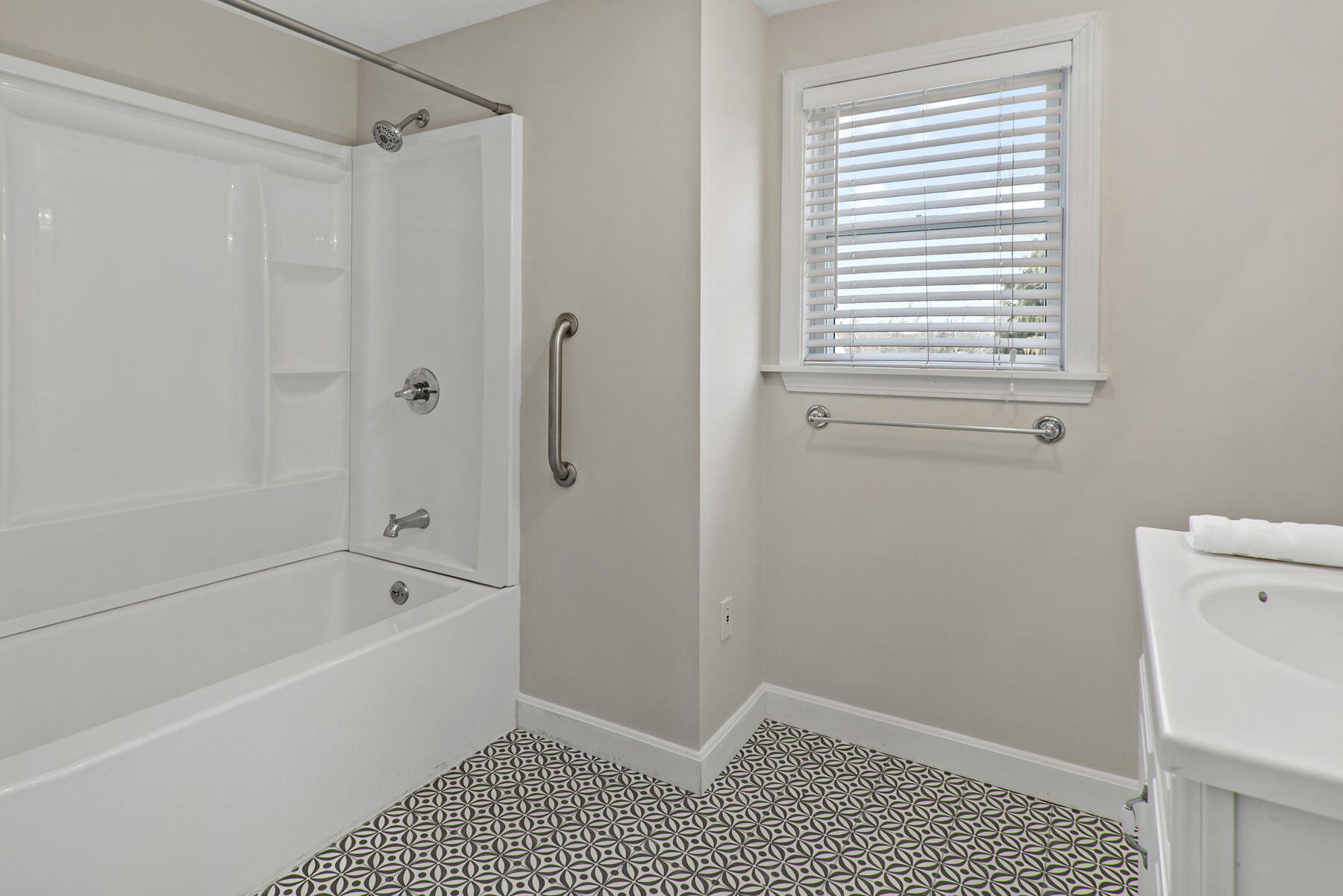 20 Evergreen Street Onset, MA 02558 - Photo 20 of 26 a bathroom with a bathtub and a shower
