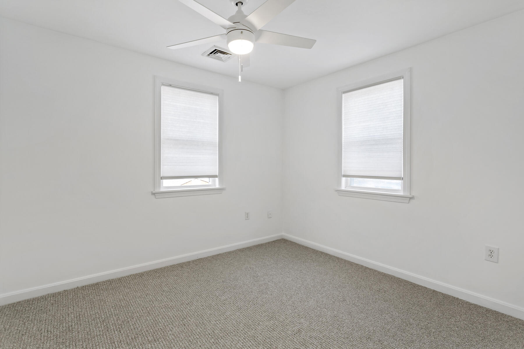 20 Evergreen Street Onset, MA 02558 - Photo 24 of 26 an empty room with a window and a fan