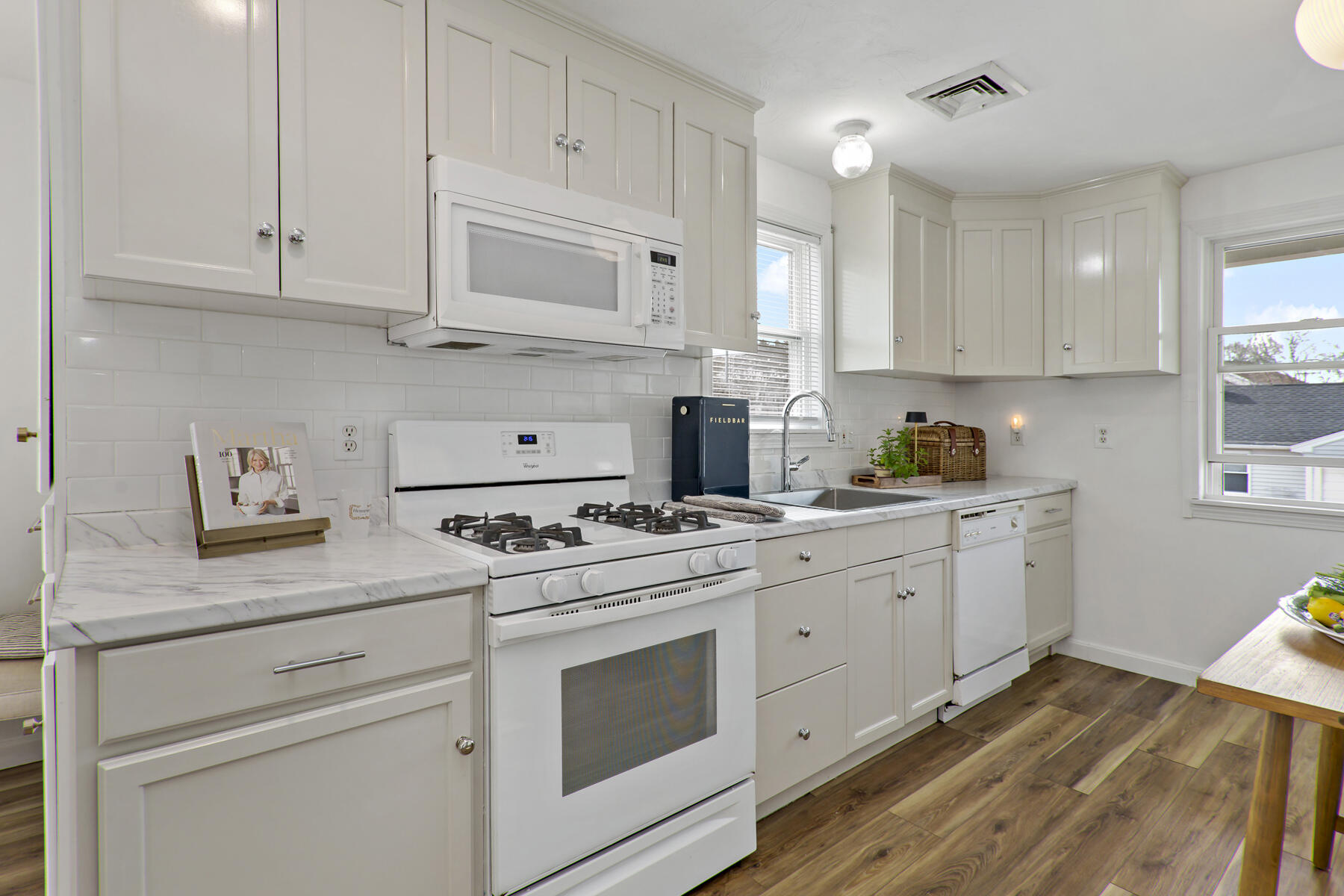 20 Evergreen Street Onset, MA 02558 - Photo 7 of 26 a kitchen with cabinets appliances a sink and a window