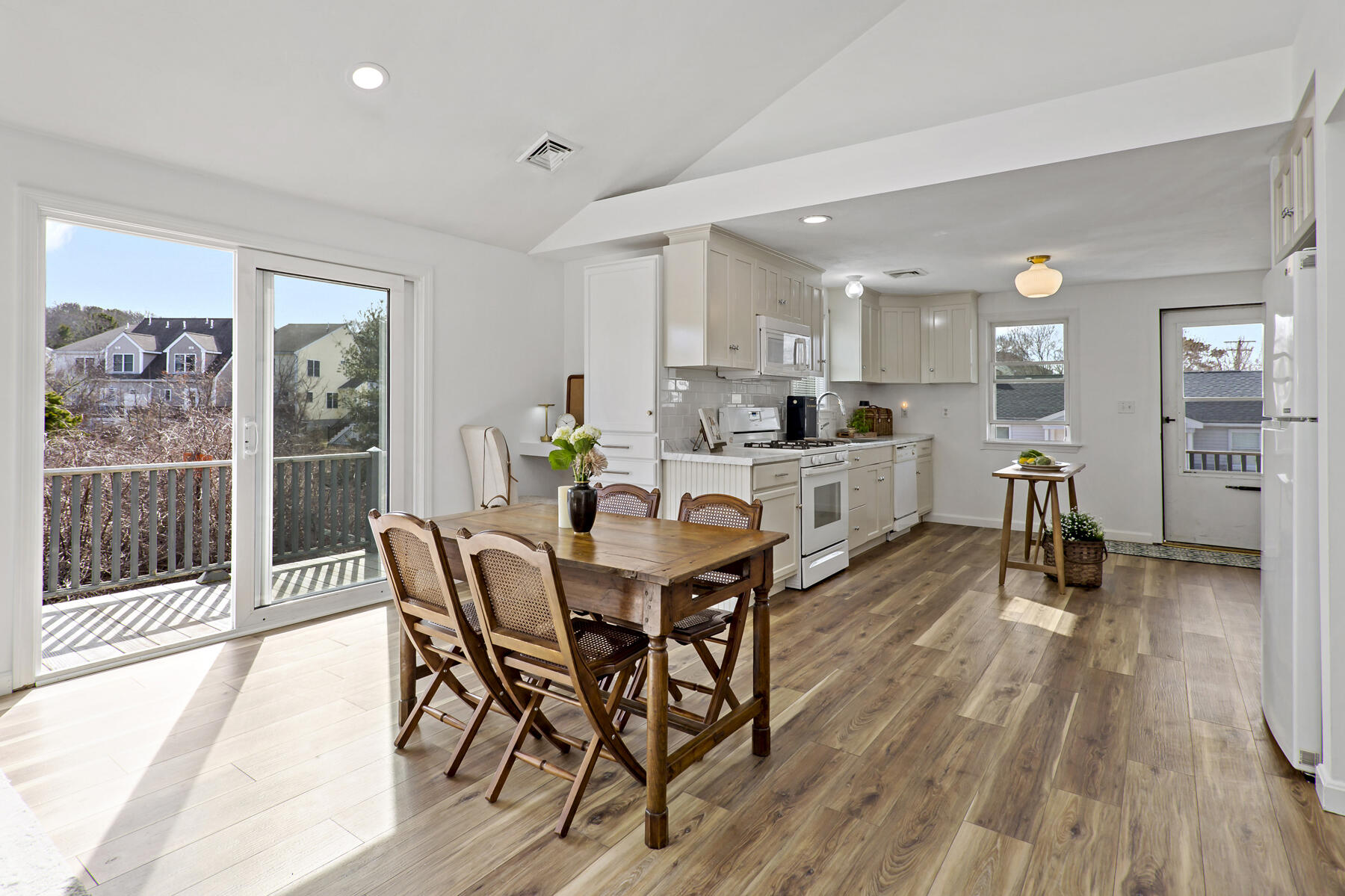 20 Evergreen Street Onset, MA 02558 - Photo 9 of 26 a view of a dining room with furniture and wooden floor
