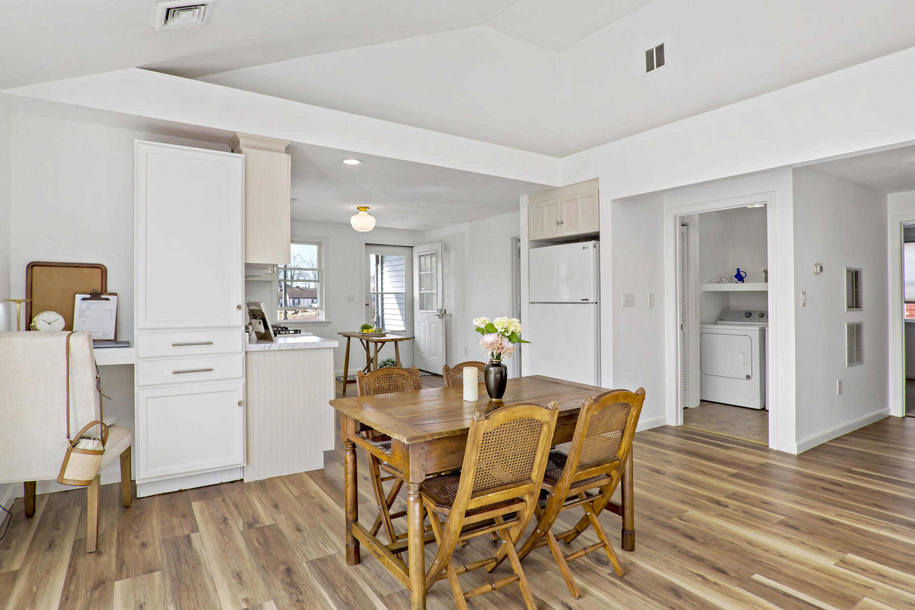 20 Evergreen Street Onset, MA 02558 - Photo 10 of 26 a view of a dining room with furniture and wooden floor