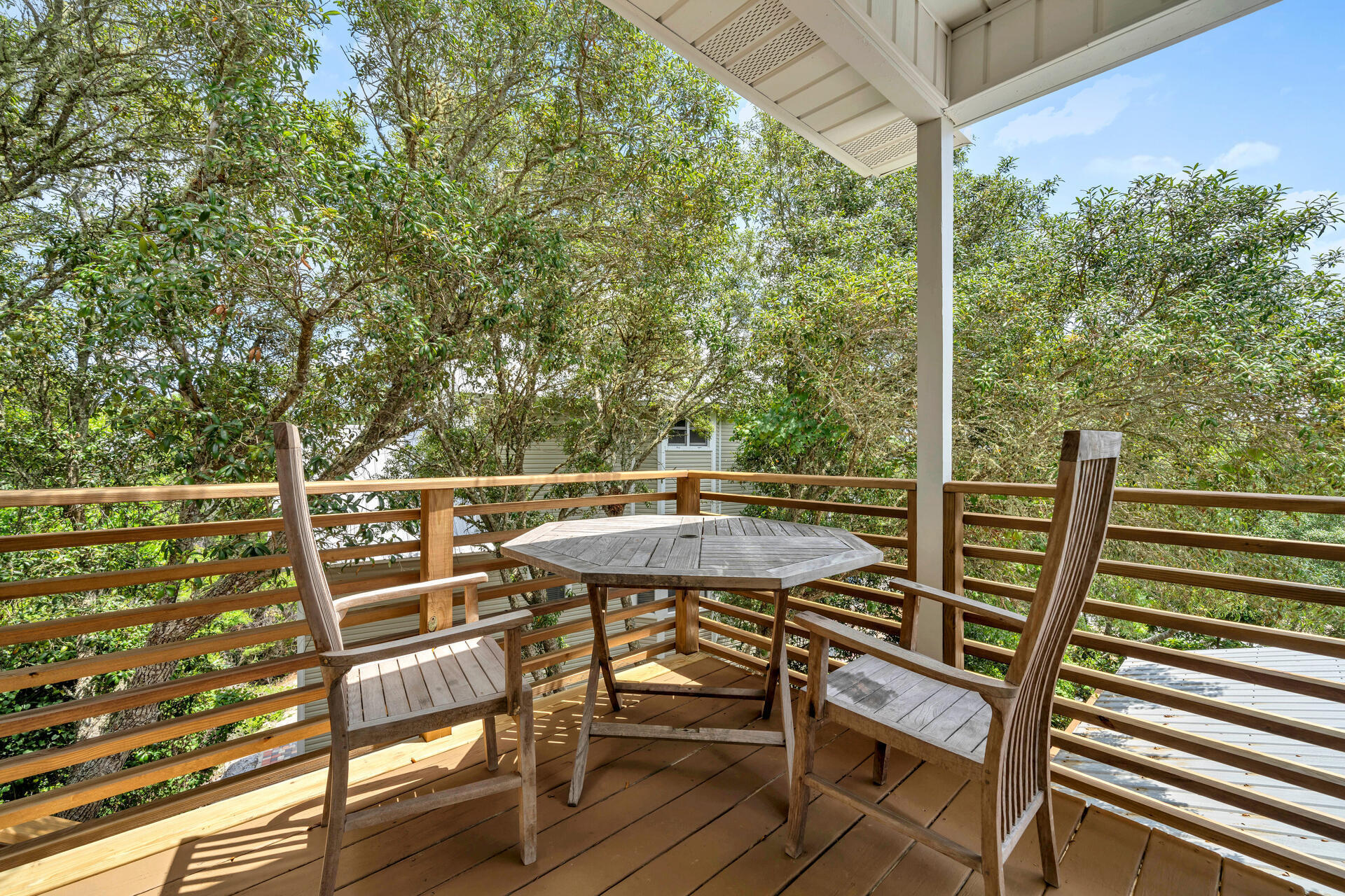 6296 West County Highway 30A Santa Rosa Beach, FL 32459 - Photo 26 of 121 a view of a chairs and table in the balcony