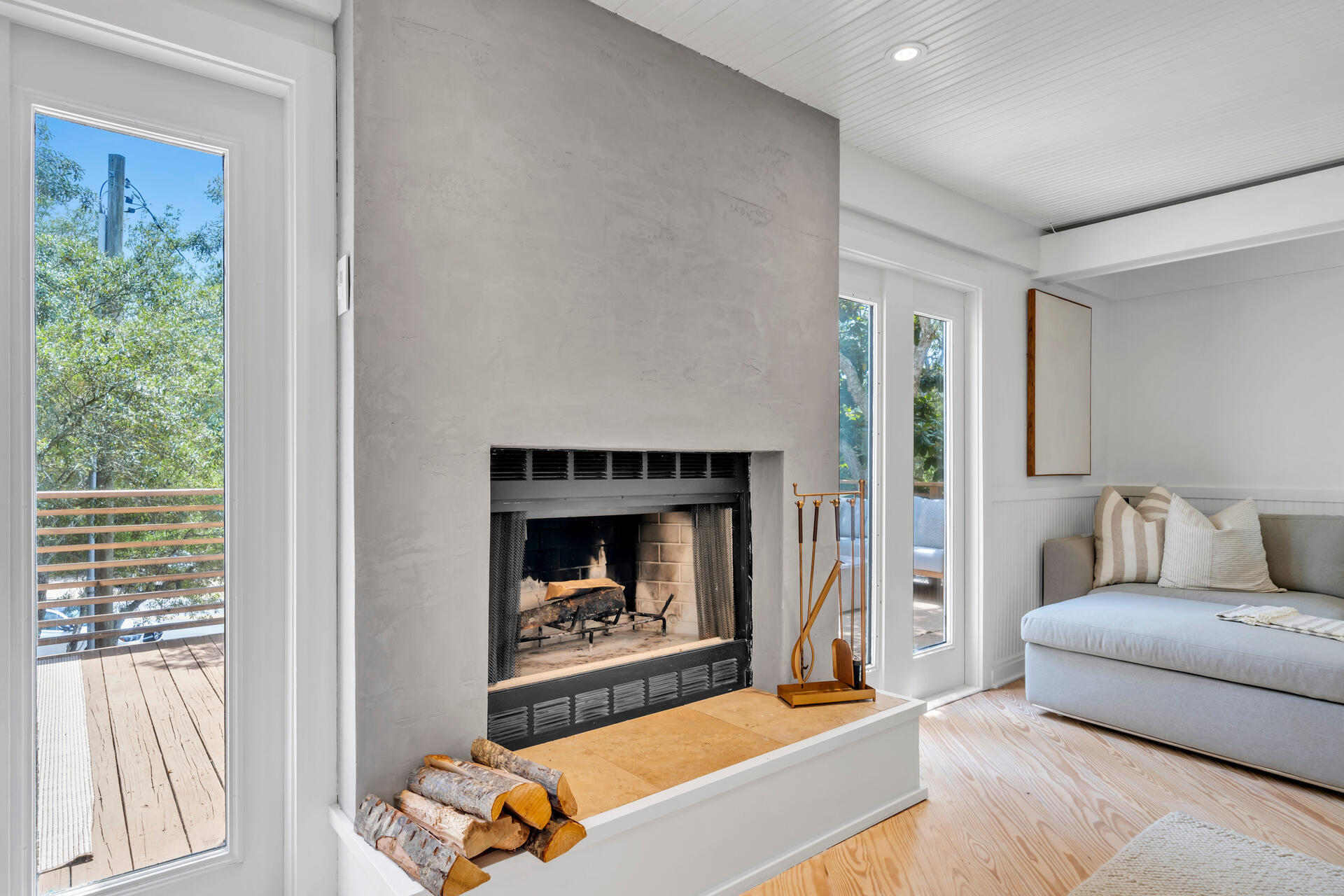 6296 West County Highway 30A Santa Rosa Beach, FL 32459 - Photo 31 of 121 a living room with furniture and a fireplace