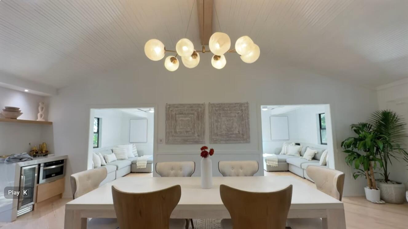 6296 West County Highway 30A Santa Rosa Beach, FL 32459 - Photo 49 of 121 a living room with fireplace furniture and a potted plant