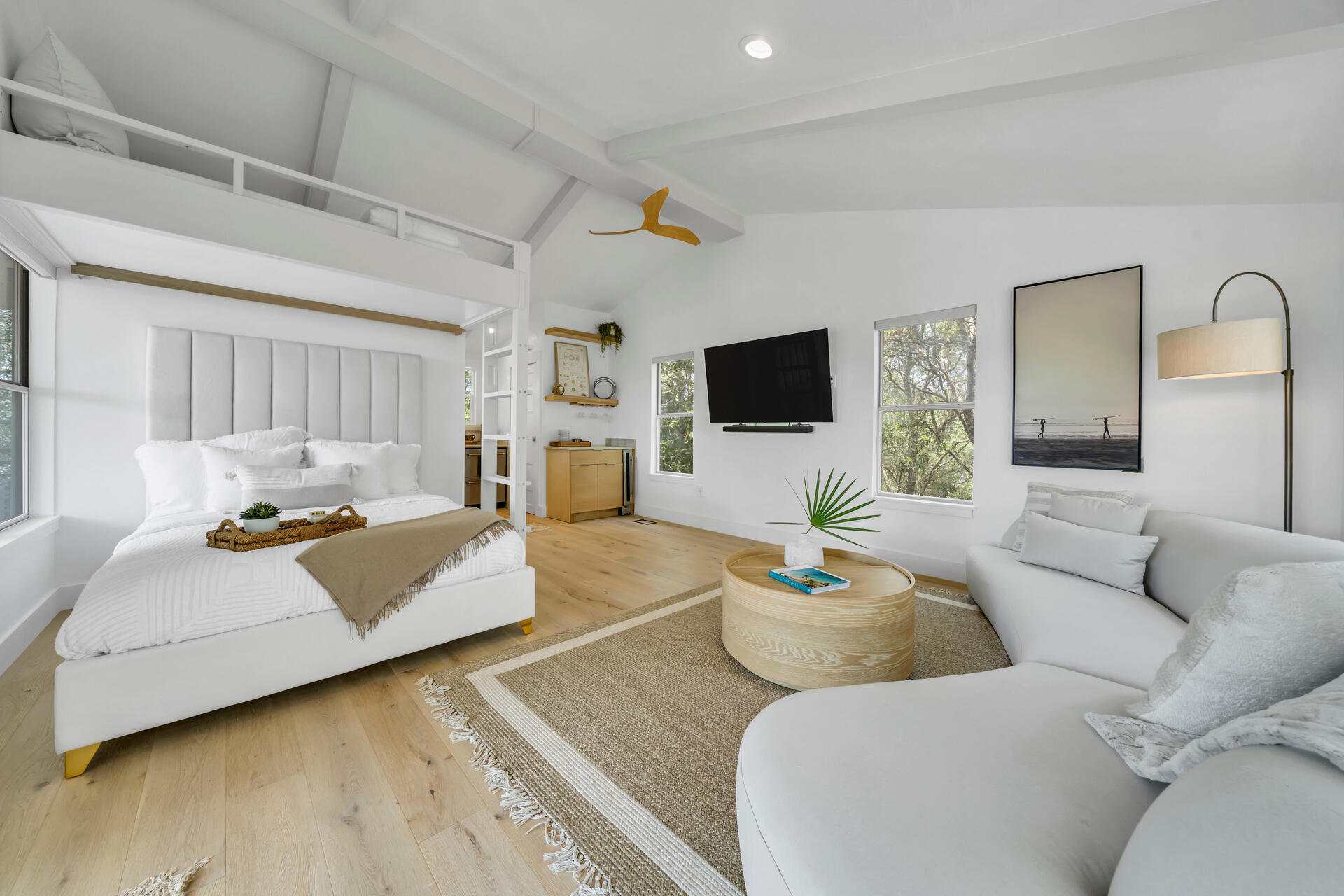 6296 West County Highway 30A Santa Rosa Beach, FL 32459 - Photo 5 of 121 a living room with furniture and a flat screen tv