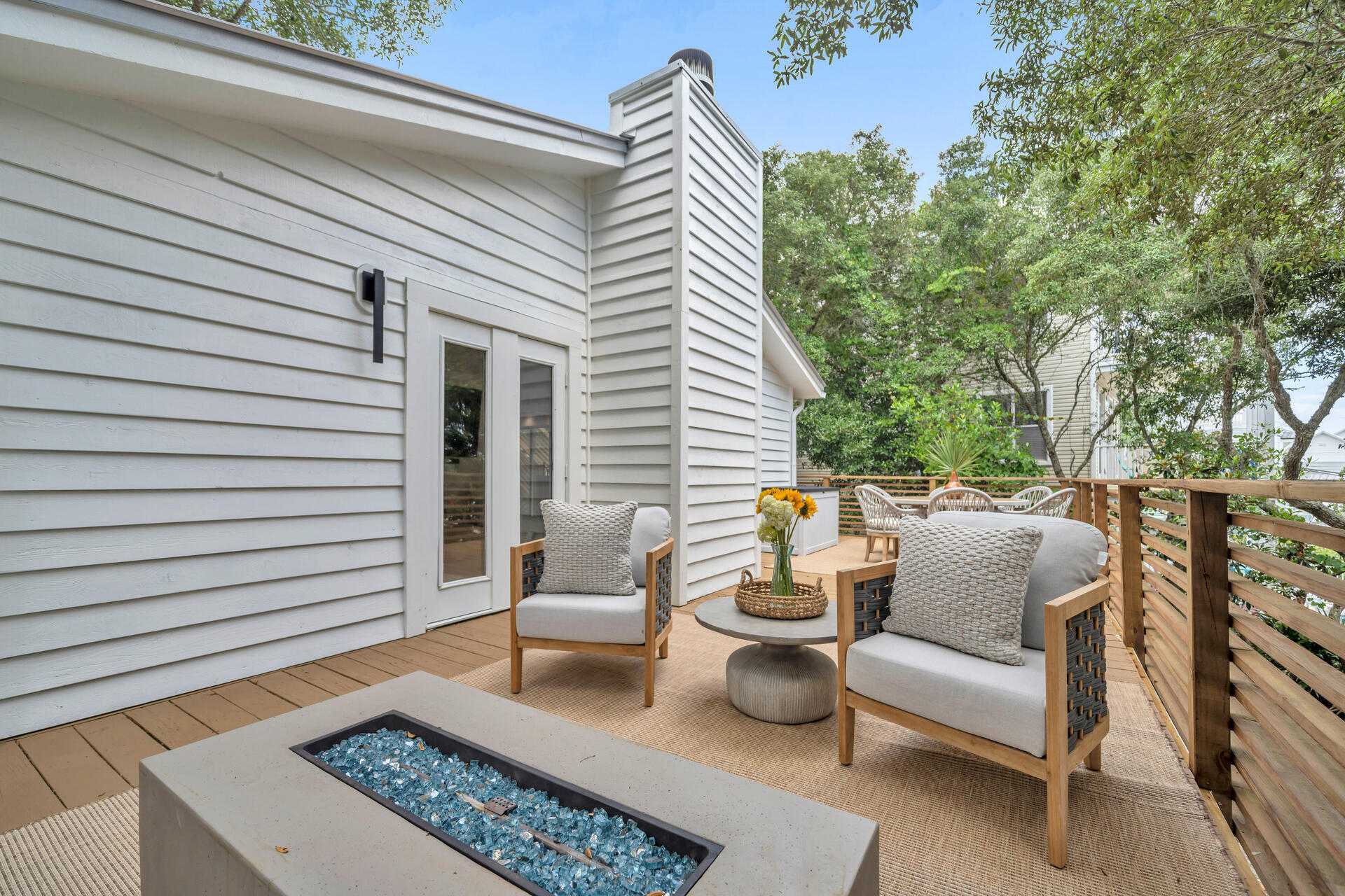 6296 West County Highway 30A Santa Rosa Beach, FL 32459 - Photo 74 of 121 a balcony with furniture and a potted plant