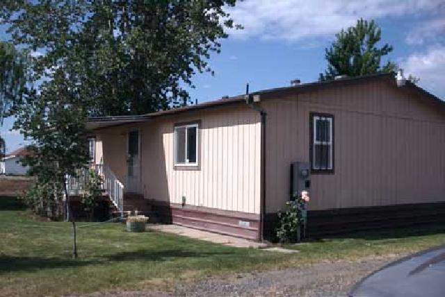 5131 Lateral A Road Wapato, WA 98951 - Photo 7 of 7 a view of a house with a yard