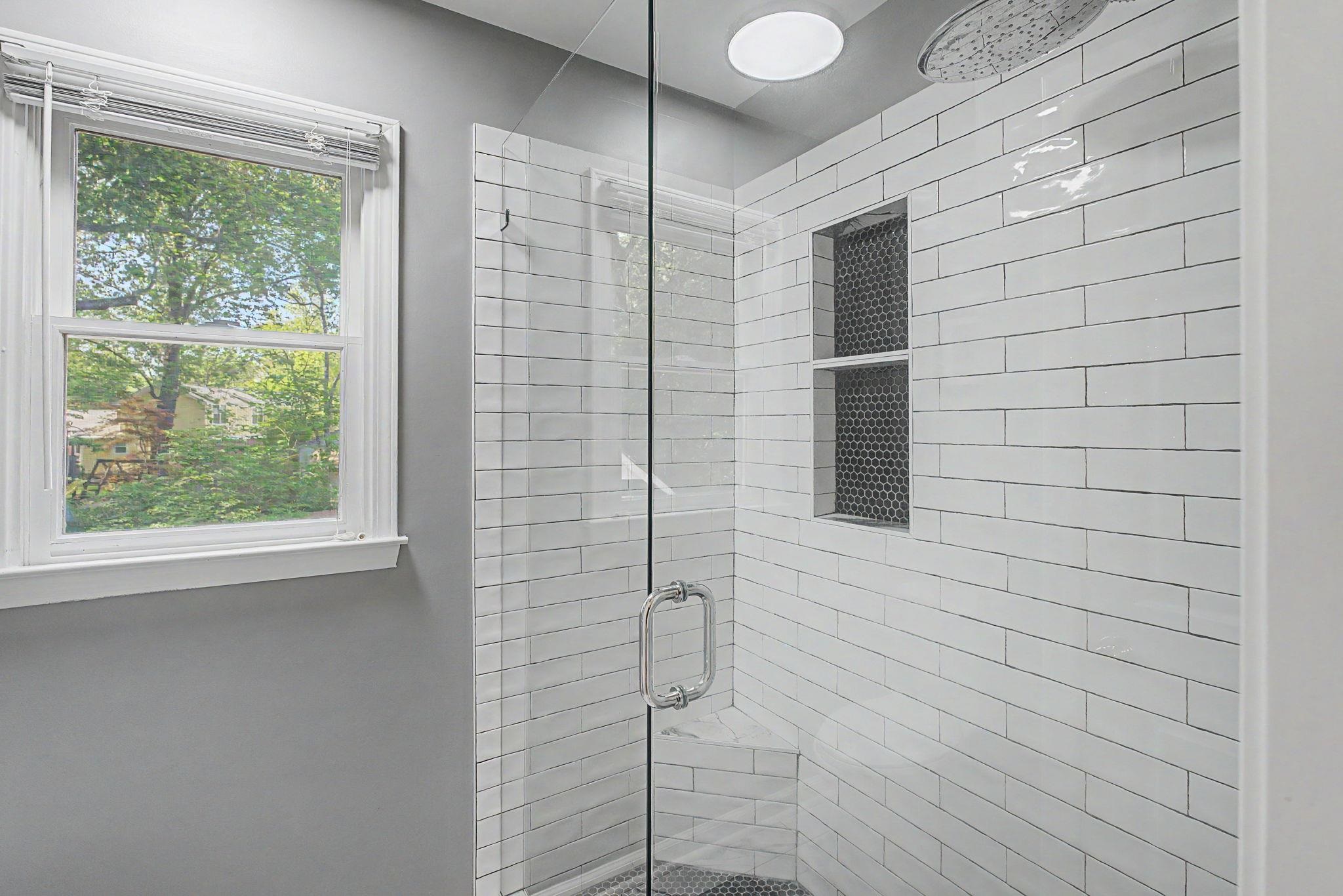 337 Revell Cove Collierville, TN 38017 - Photo 29 of 40 a bathroom with a shower