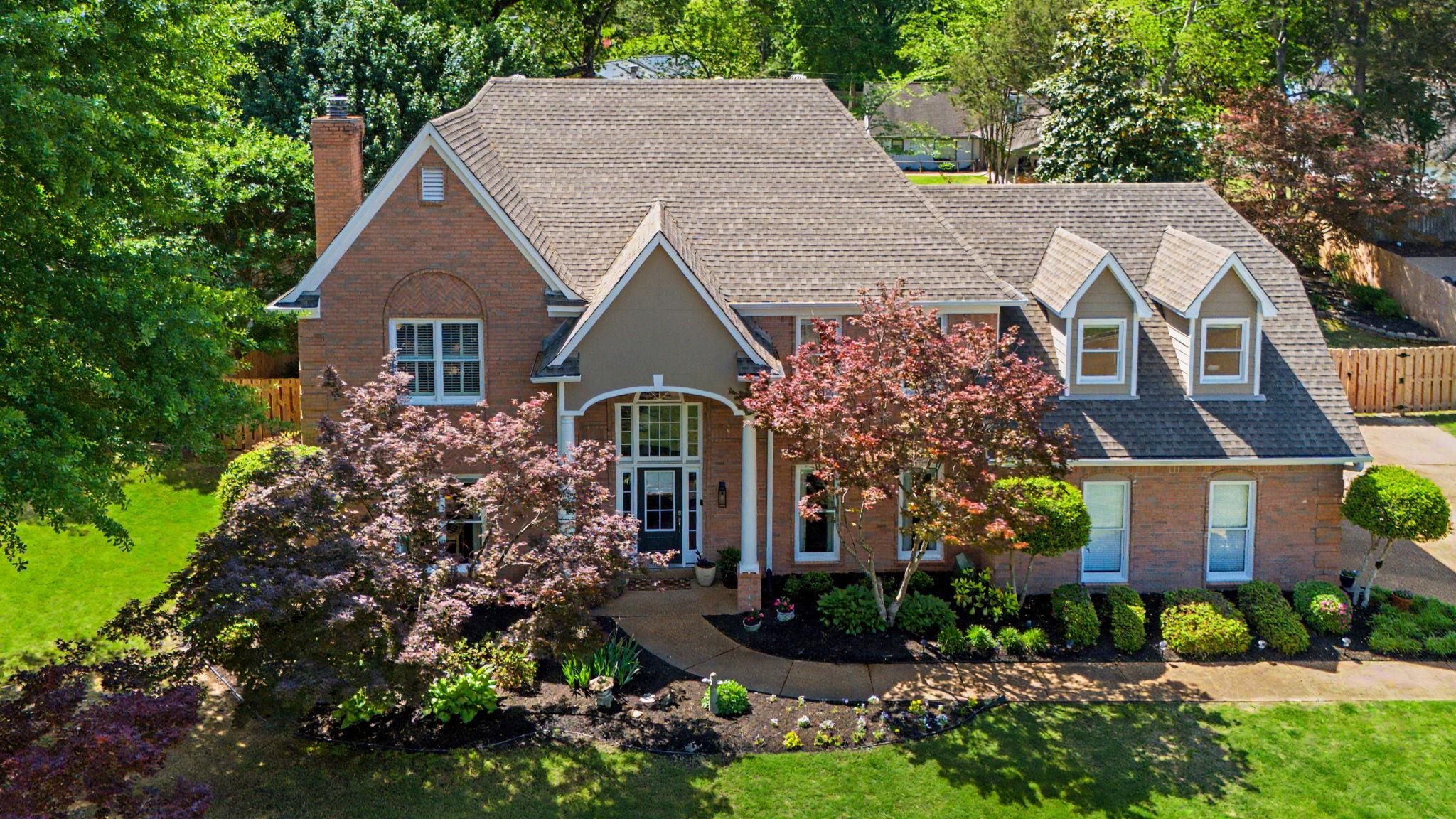 337 Revell Cove Collierville, TN 38017 - Photo 3 of 40 front view of a house with a yard