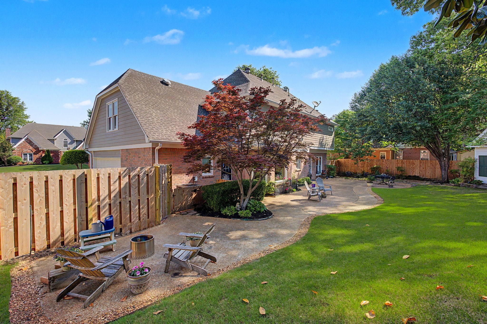 337 Revell Cove Collierville, TN 38017 - Photo 32 of 40 a view of backyard with a patio and outdoor seating