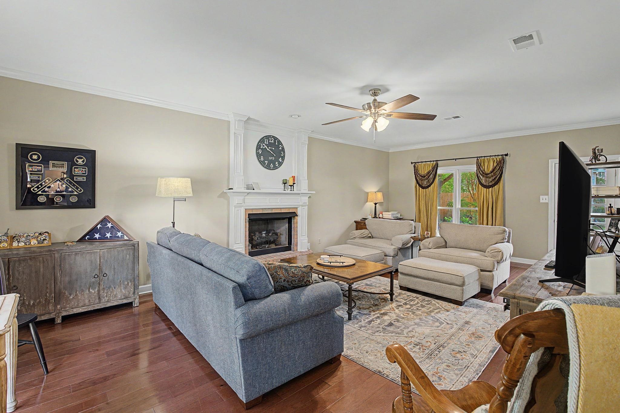 337 Revell Cove Collierville, TN 38017 - Photo 8 of 40 a living room with furniture and a fireplace