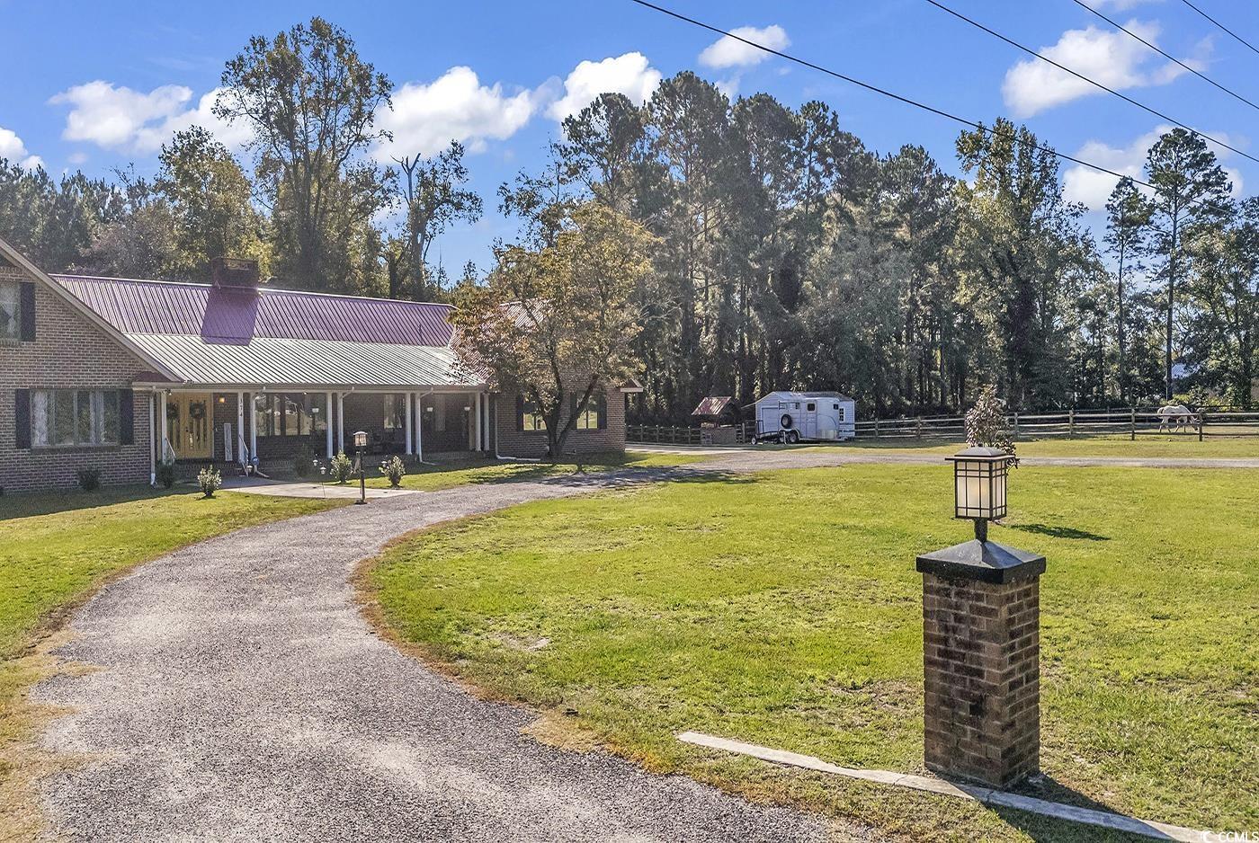 374 North Cox Road Loris, SC 29569 - Photo 36 of 40 Surrounding community with a lawn
