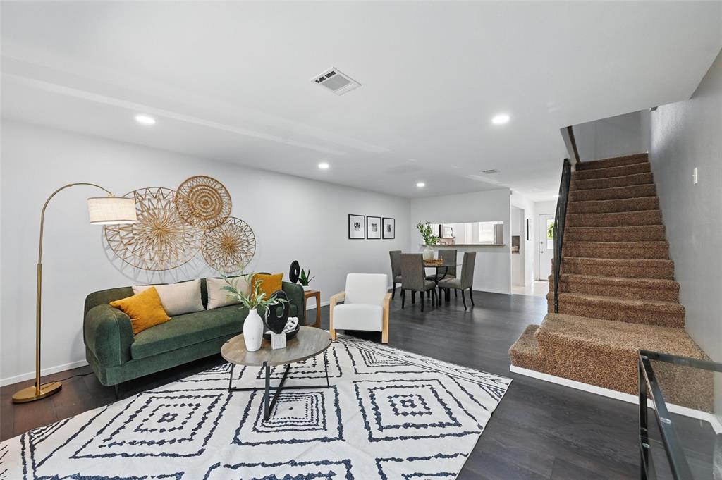 19 Abbey Road Euless, TX 76039 - Photo 1 of 1 a living room with furniture and wooden floor