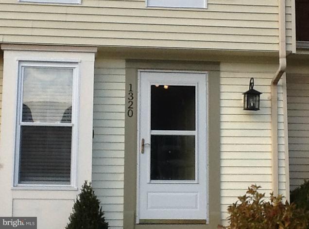 1320 Apple Ridge Court Edgewood, MD 21040 - Photo 2 of 26 a view of front door and potted plants